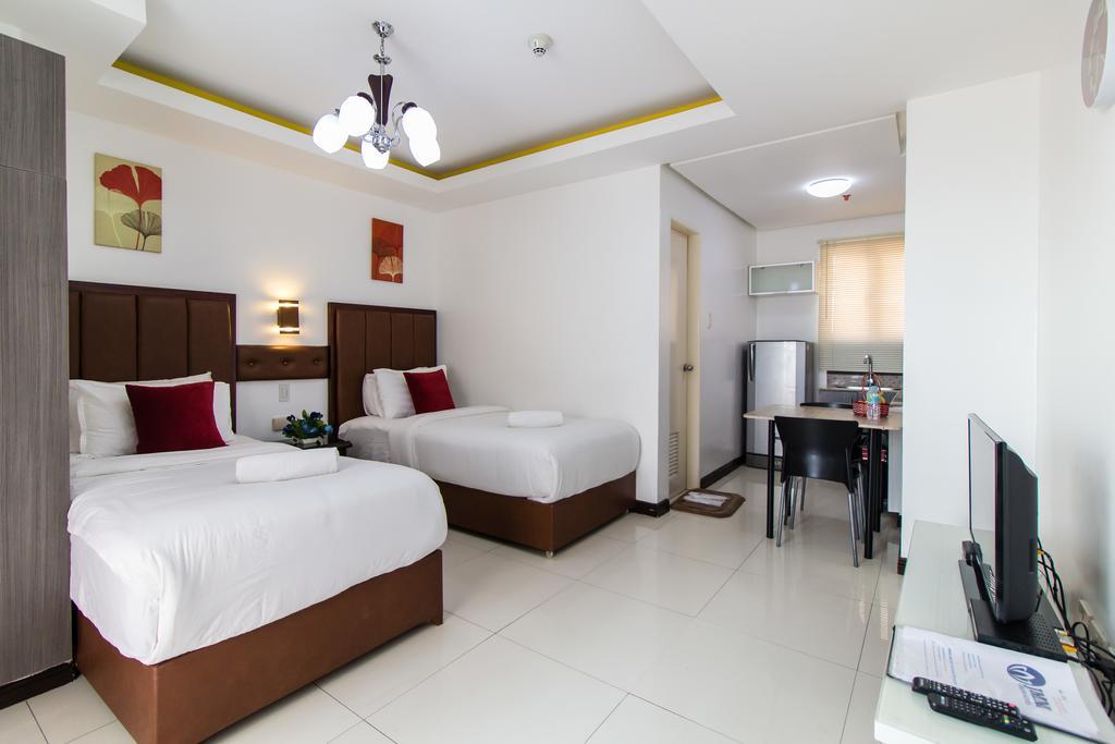 Jmm Apartment Suites Manilla Buitenkant foto